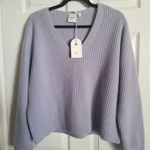 Oversized V-neck sweater from Elk the Label